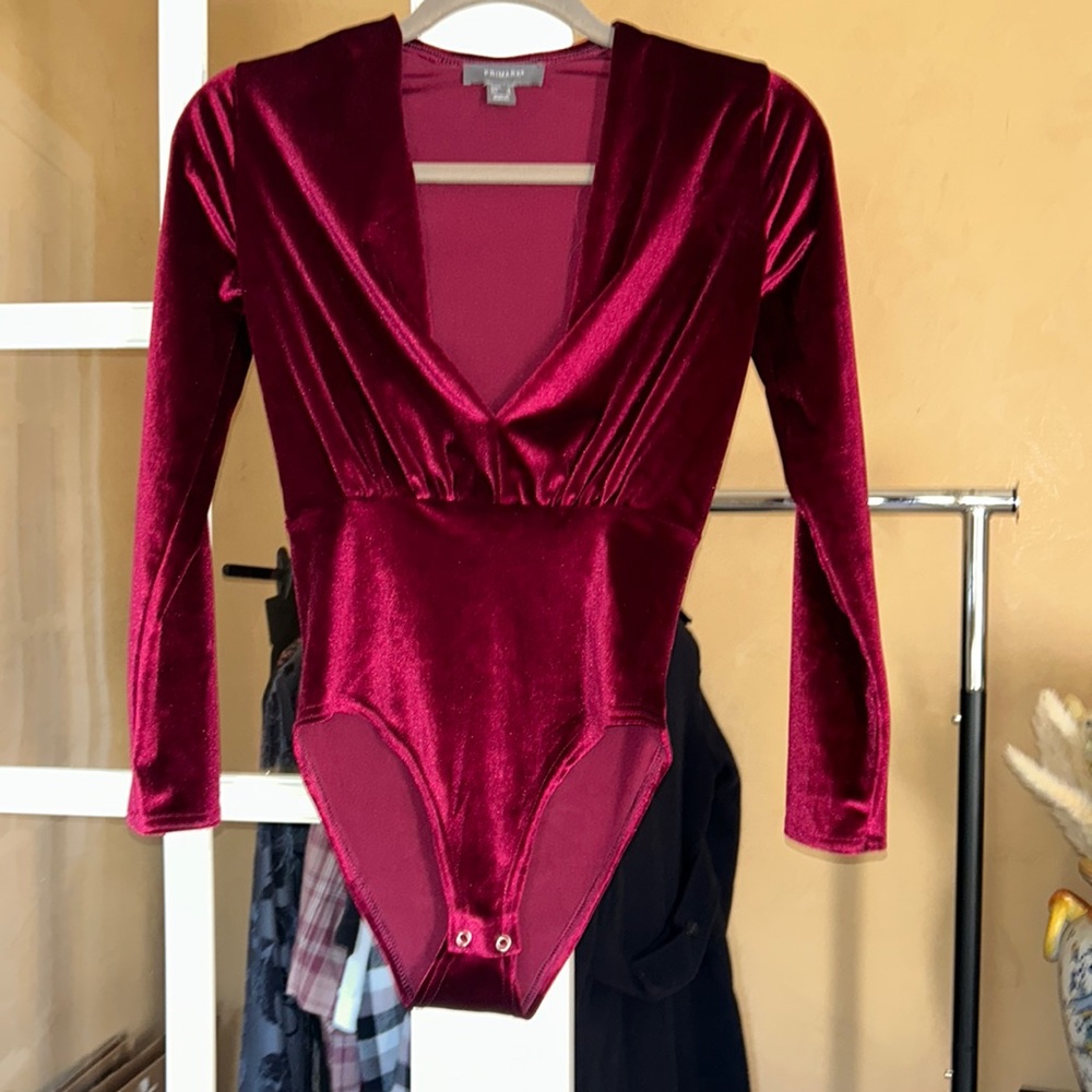 v neck style body suit. Tight fitting